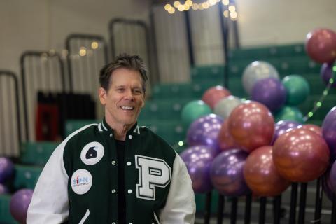 Kevin Bacon with letterman jacket