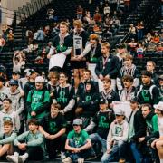 Boys wrestling pose with their 2nd place trophy- credit to Jody Murphy