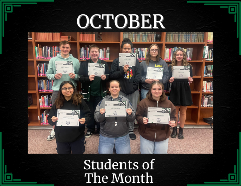 October Students of the Month posing with their certificates