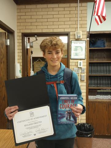 Ryland Fratto with certificate and book 