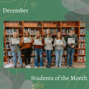 Each of the students of the month pose with their certificates. 