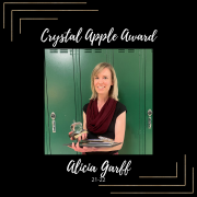 Alicia Garff poses with her Crystal Apple Award