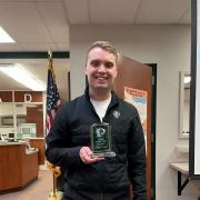 Mr. Field with his award