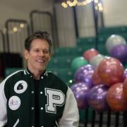Kevin Bacon with letterman jacket